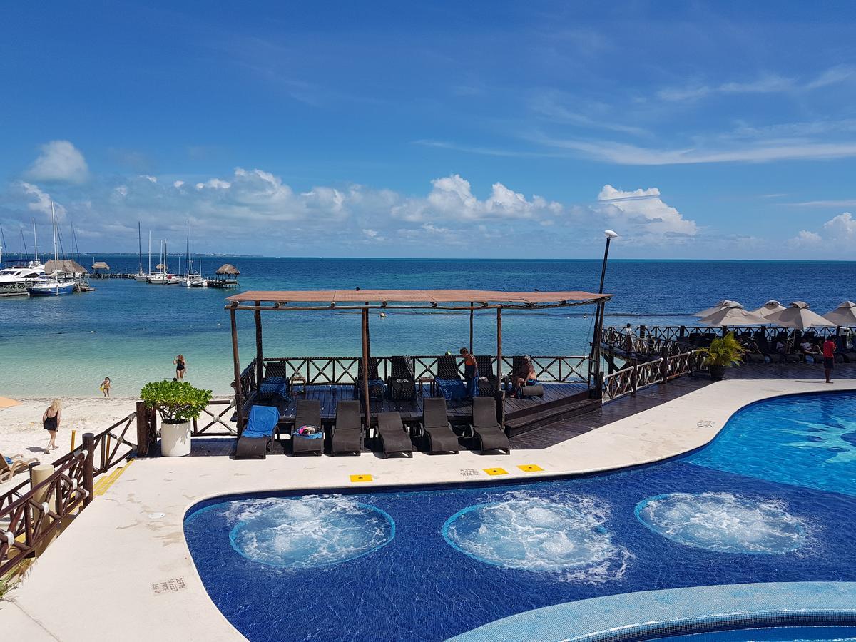 Suite frente al Mar Cancún Exterior foto