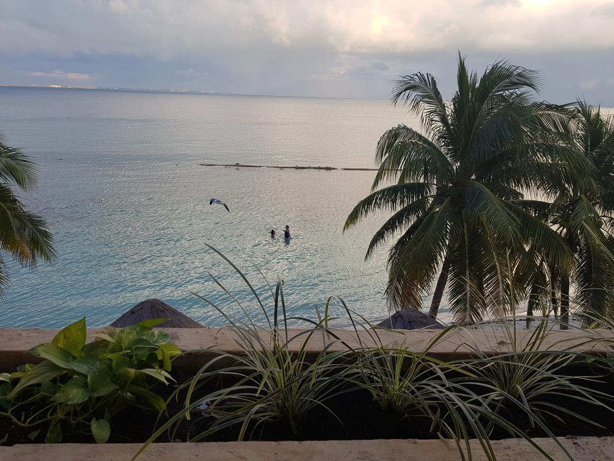 Suite frente al Mar Cancún Exterior foto