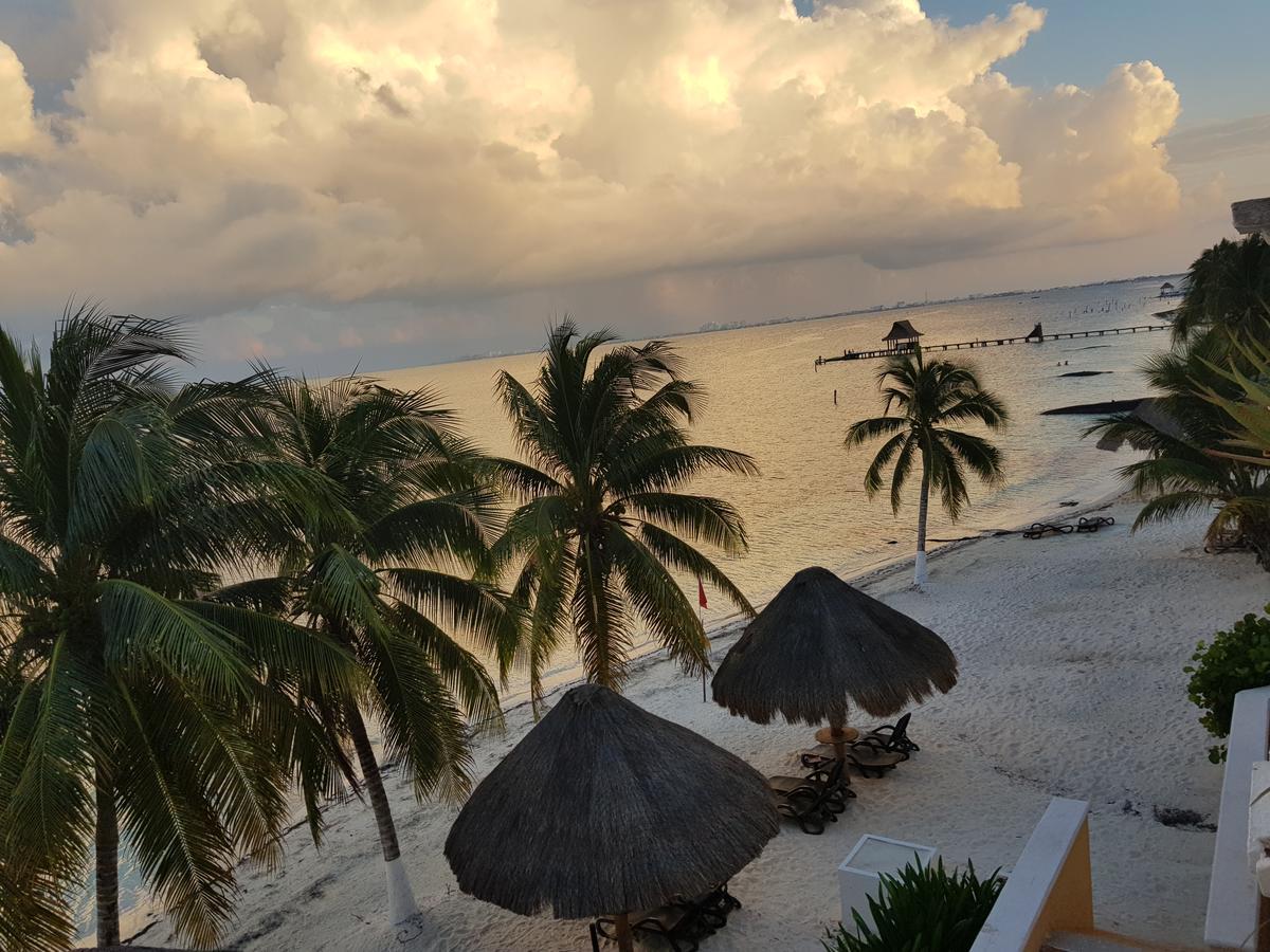 Suite frente al Mar Cancún Exterior foto
