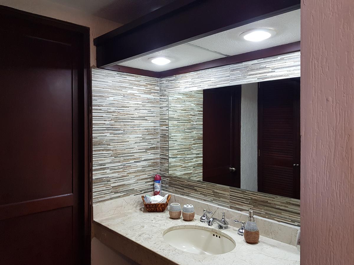 Suite frente al Mar Cancún Exterior foto