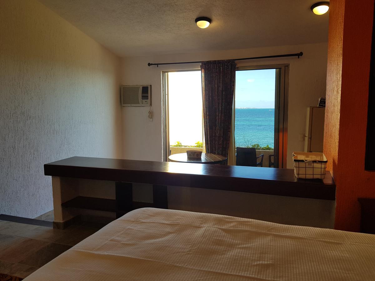 Suite frente al Mar Cancún Exterior foto