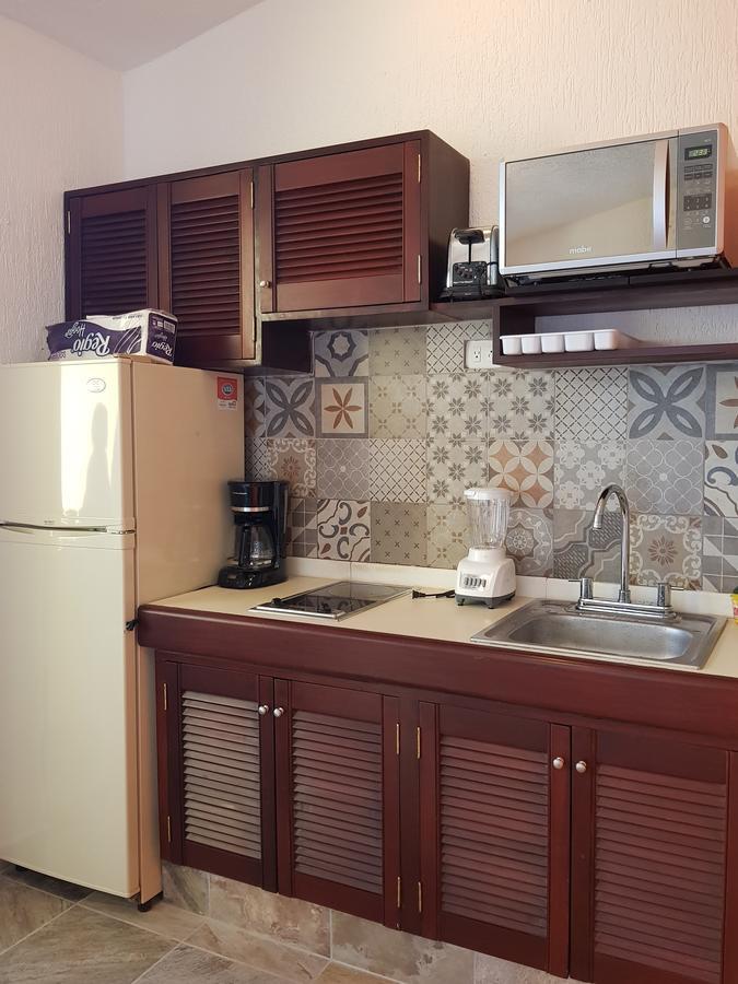 Suite frente al Mar Cancún Exterior foto