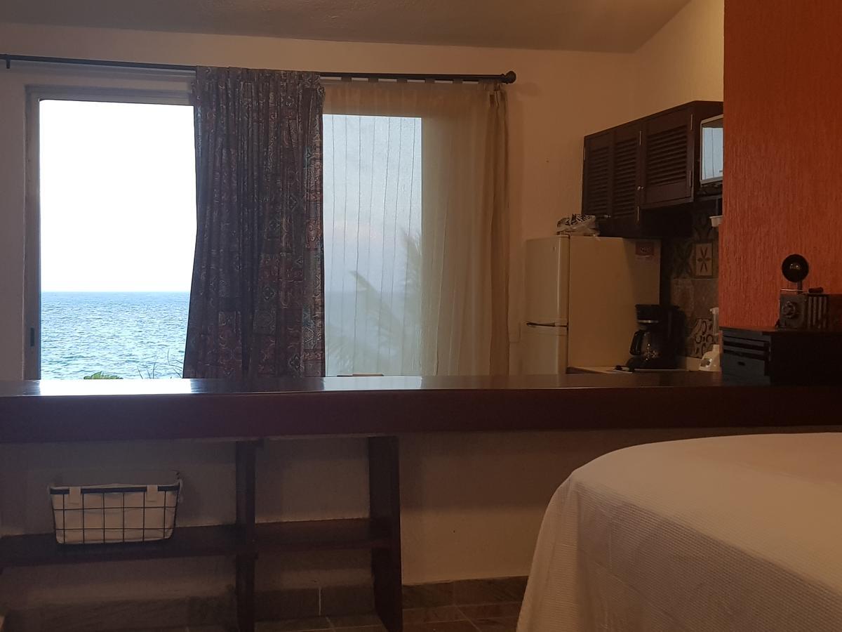 Suite frente al Mar Cancún Exterior foto