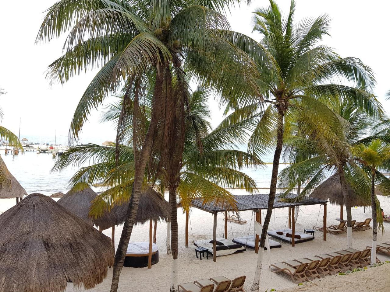 Suite frente al Mar Cancún Exterior foto